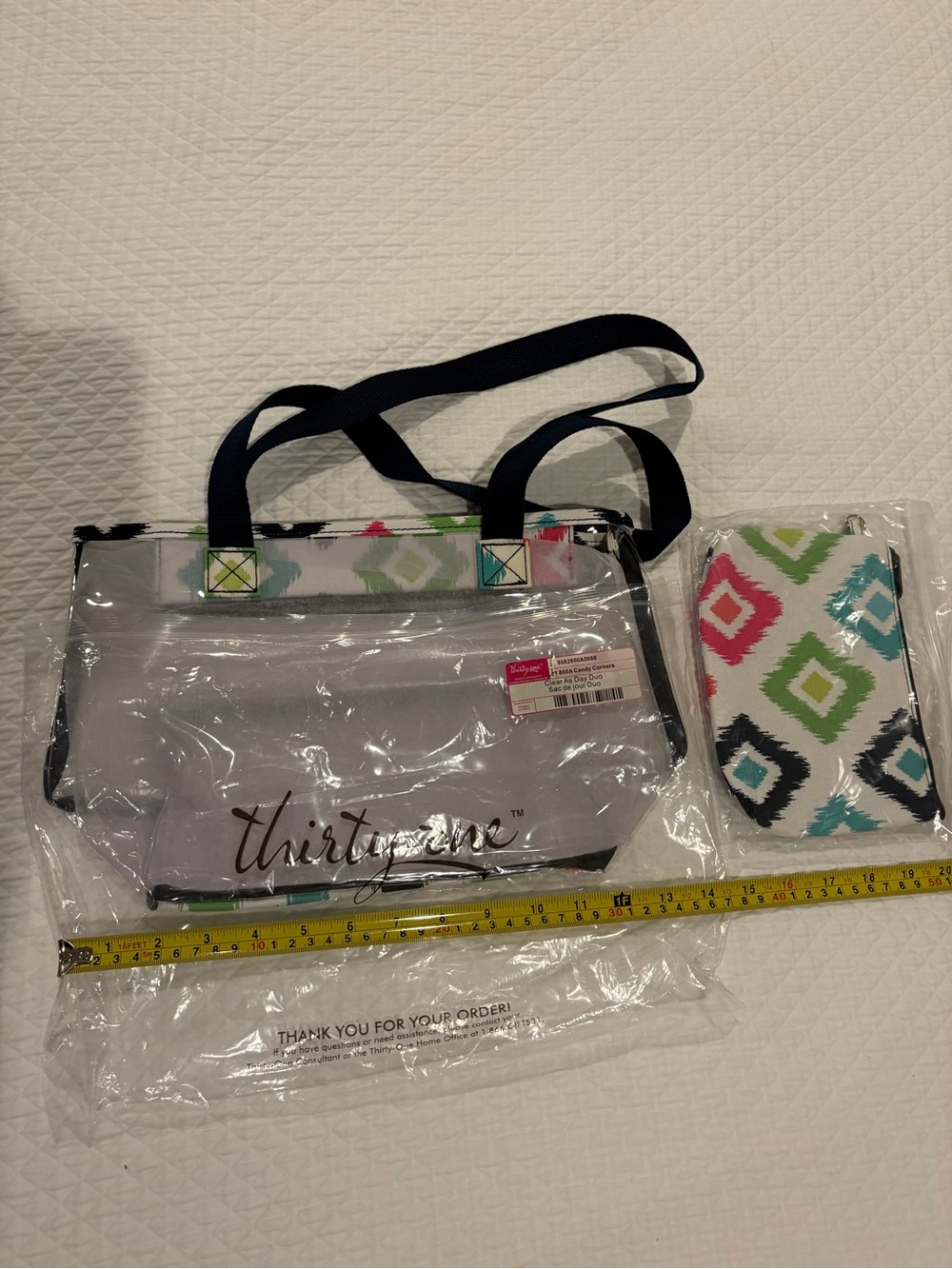 thirty-one Clear Tote with Navy Handles and Colorful Ikat Accent